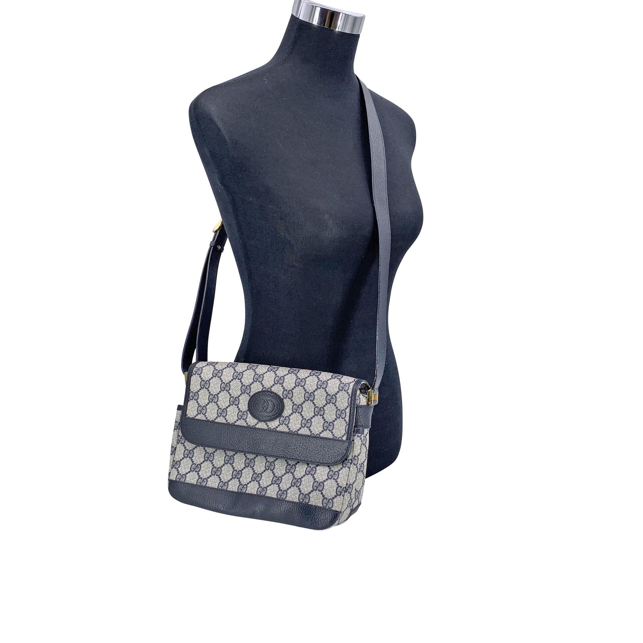 A true classic from GUCCI's elegant archives, this vintage monogram shoulder bag captures the quiet sophistication of an earlier era. Crafted in the brand's signature blue GG monogram canvas, the bag is trimmed with smooth genuine leather and