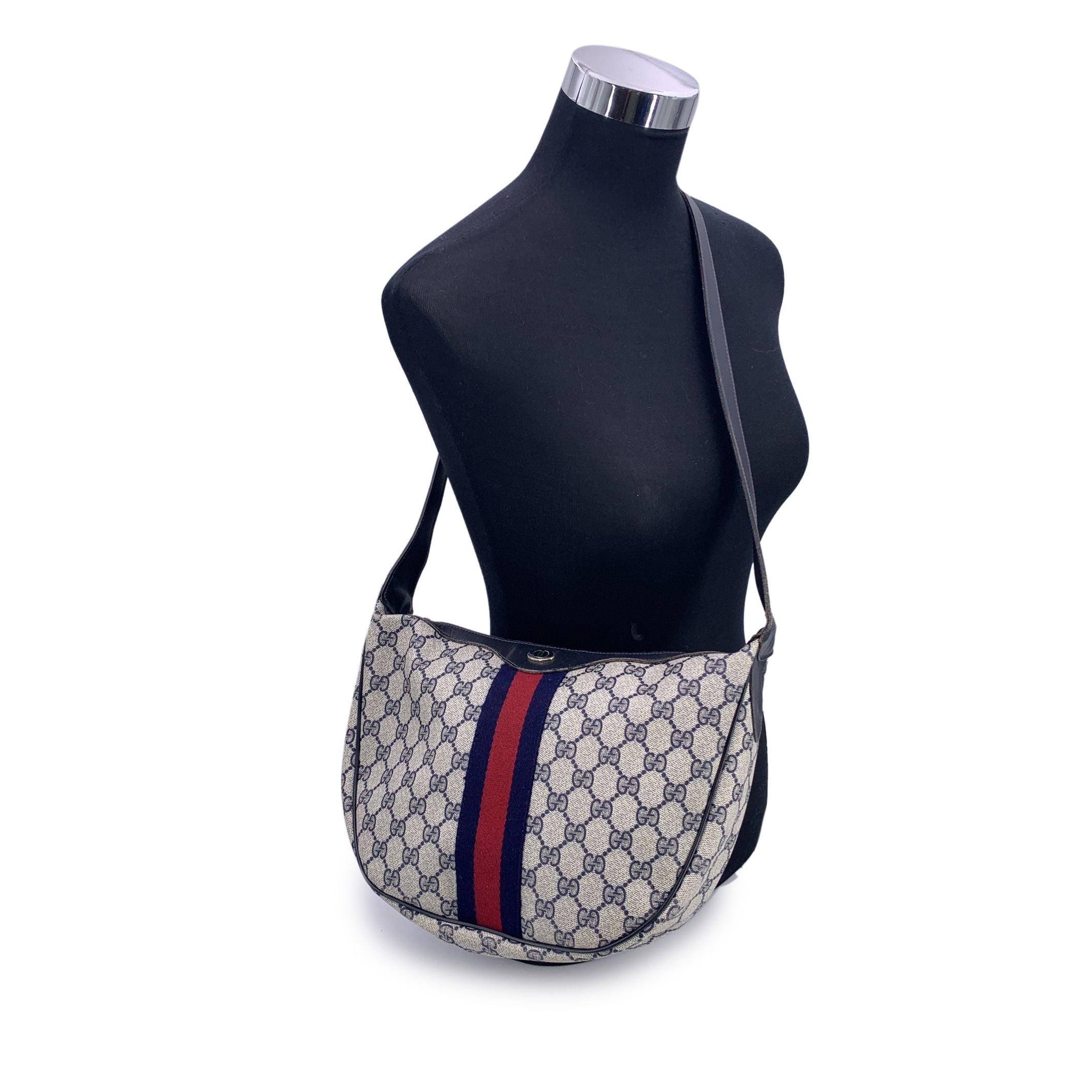 A true classic from GUCCI's elegant archives, this vintage monogram shoulder bag captures the quiet sophistication of an earlier era. Crafted in the brand's iconic blue GG monogram canvas, it's thoughtfully trimmed with smooth genuine leather, and
