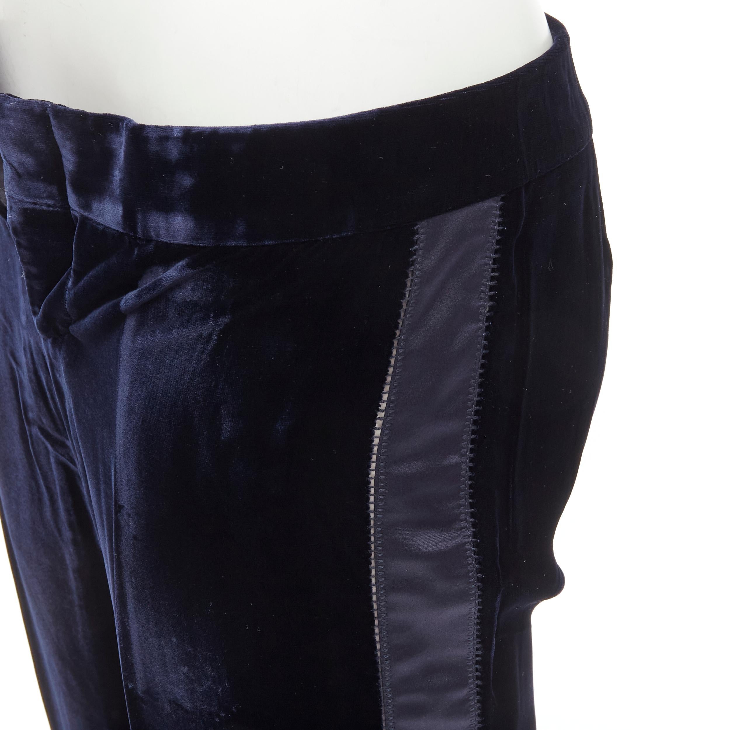 GUCCI Vintage navy blue velvet ladder seam side stripe tuxedo pants IT38 XS 
Reference: ANWU/A00571 
Brand: Gucci 
Material: Velvet 
Color: Navy 
Pattern: Solid 
Closure: Zip 
Extra Detail: Velvet outer. Side stripe with ladder seams exposing a