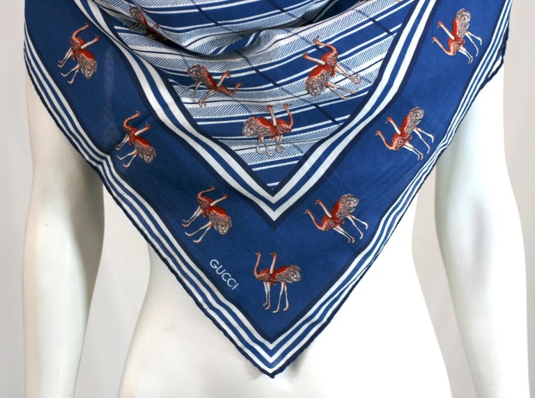 Large Gucci Vintage Ostrich print cotton scarf from the 1970's. Pairs of dancing ostriches on an Art Deco style ground in soft cotton with blue border. This original print is now featured in the Gucci Archives.
1970's Italy.  
33