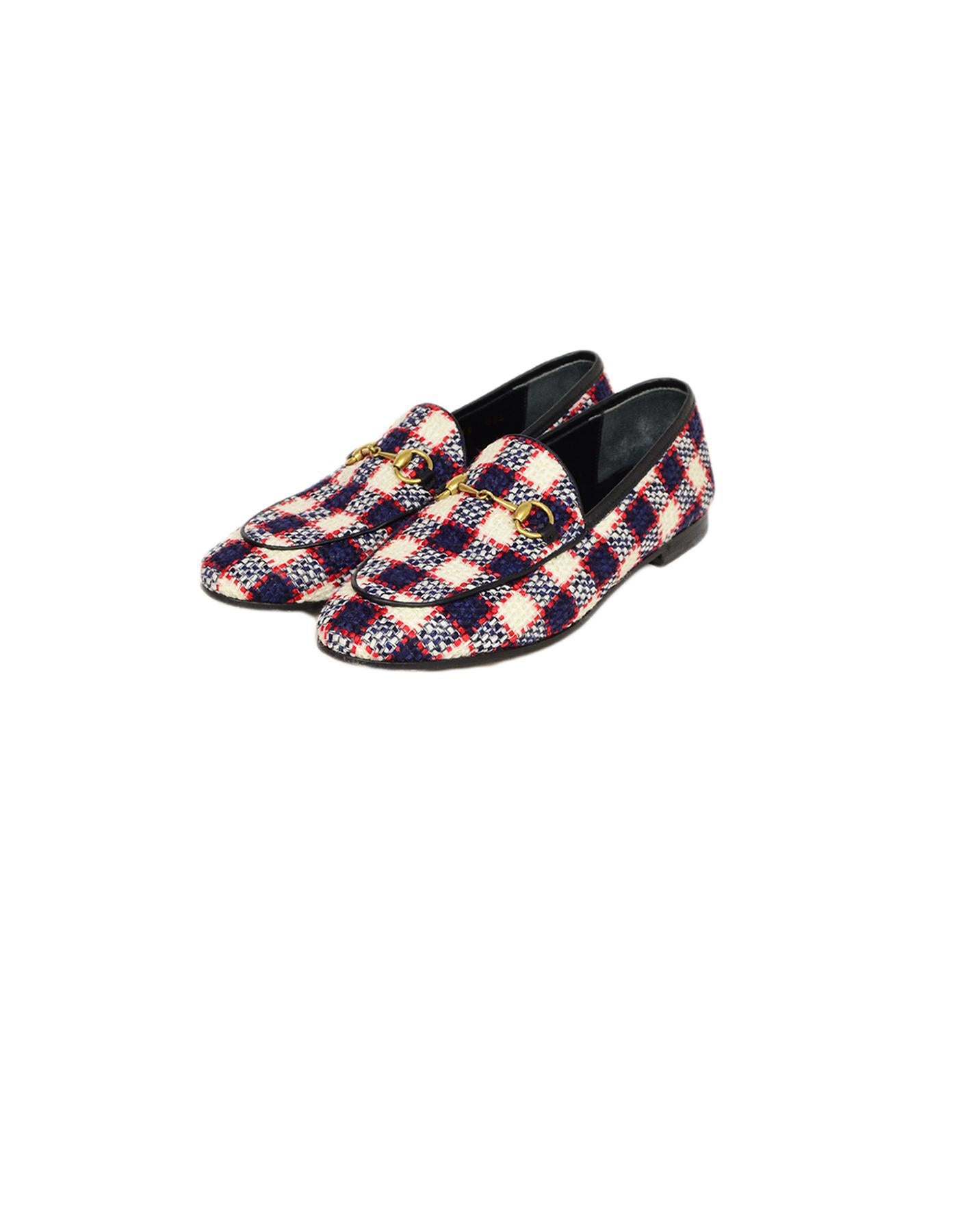 Gucci Vintage Plaid Tweed New Jordaan Check Loafers sz 38

Made In: Italy
Color: Plaid
Hardware: Goldtone
Materials: Tweed, Leather
Closure/Opening: Slip-on
Overall Condition: Excellent vintage condition, with the exception of wear on the heels and
