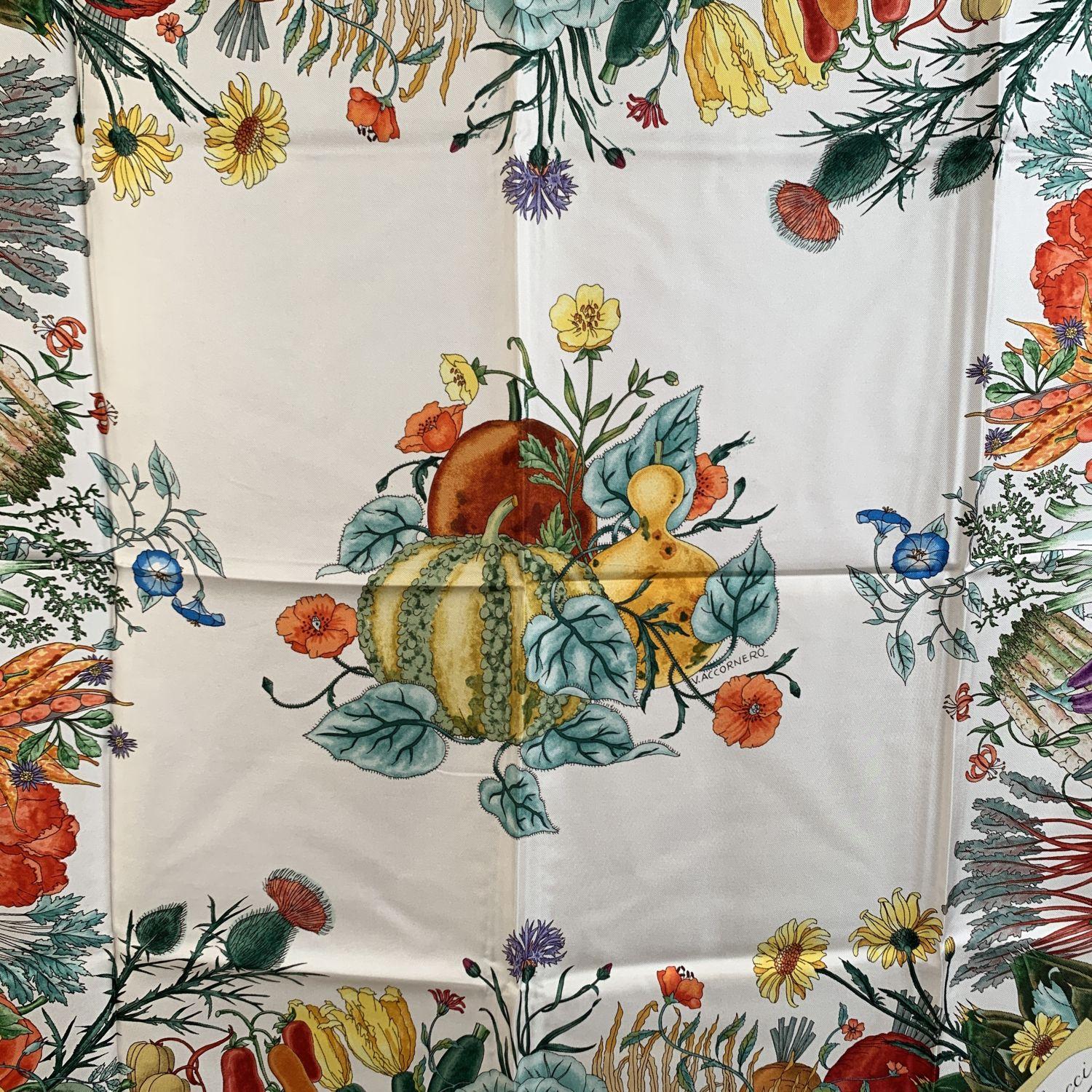 Vintage Gucci Silk Scarf designed by Vittorio Accornero. The design depicts a rich multicolored vegetable garden Burgundy border. 100% Silk. Measurements: 33 x 33 inches - 83,8 x 83.8 cm. Printed GUCCI signature, 'V.Accornero' signature printed on