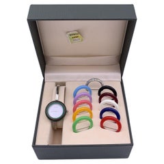 Gucci Bracelet jonc de montre-bracelet vintage en acier argenté à 12 lunettes