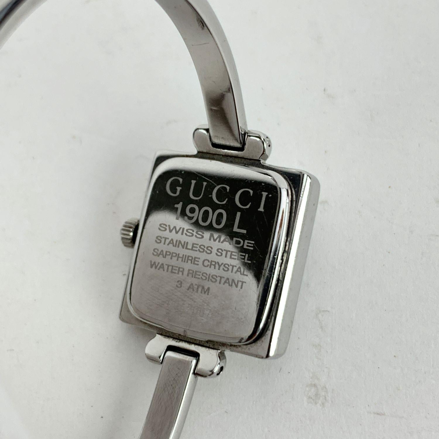 Gucci Montre-bracelet jonc vintage Mod 1900 L en acier inoxydable avec cadran noir Bon état à Rome, Rome