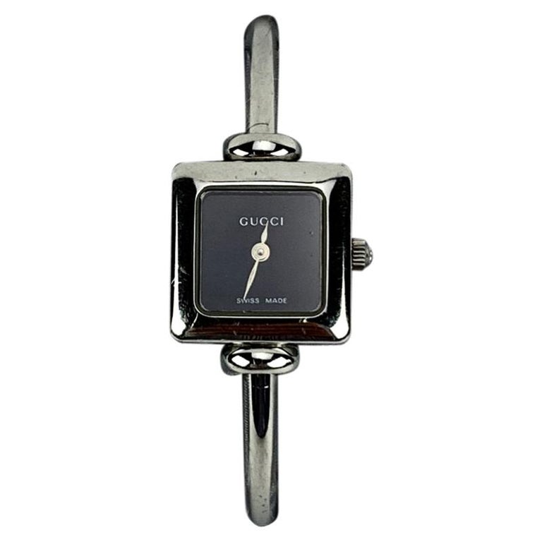 Gucci Montre-bracelet jonc vintage Mod 1900 L en acier inoxydable avec  cadran noir sur 1stDibs | montre jonc femme, montre bracelet jonc femme,  montre jonc