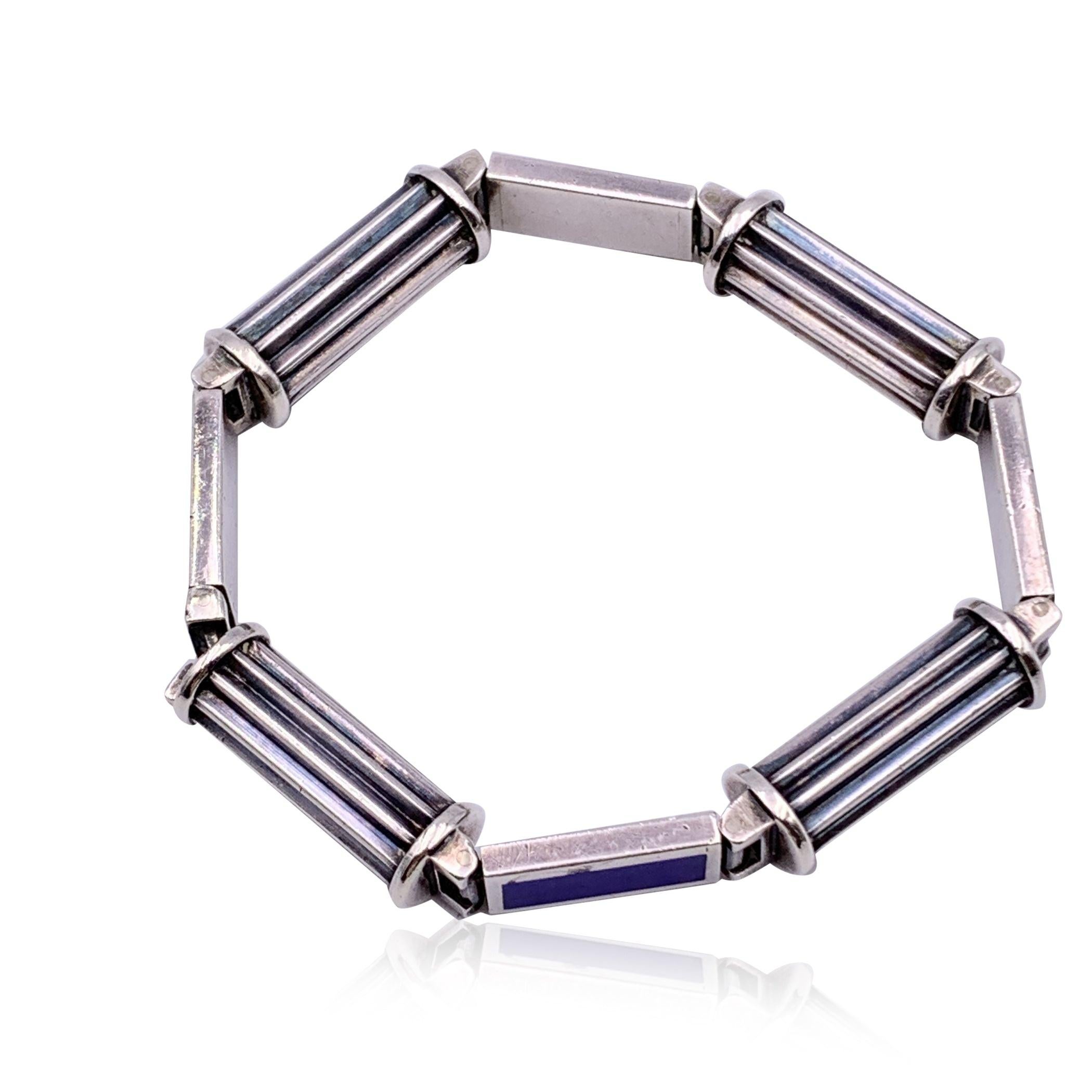 Vintage bracelet by Gucci. Made in sterling silver and blue enamel. 'Gucci Italy' and '925' hallmark engraved on the bracelet. Internal circumference: 6 inches - 15.3 cm Condition A - EXCELLENT Gently used.Minimal darkness on silver. Please, look