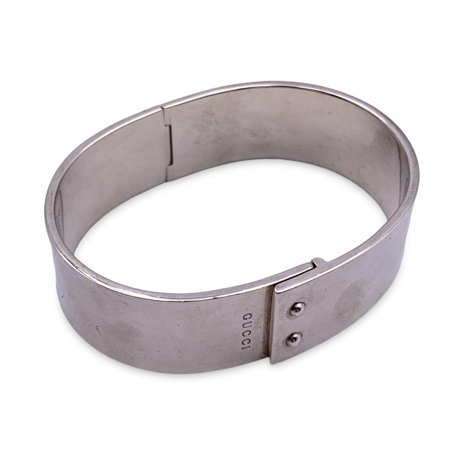 Vintage bangle bracelet by Gucci. Made in sterling silver. 'Gucci' , 'Made in Italy' and '925' hallmark engraved on the bracelet. Internal circumference: 7 inches - 17.8 cm Condition A - EXCELLENT Gently used. Very light superficial scratches on the
