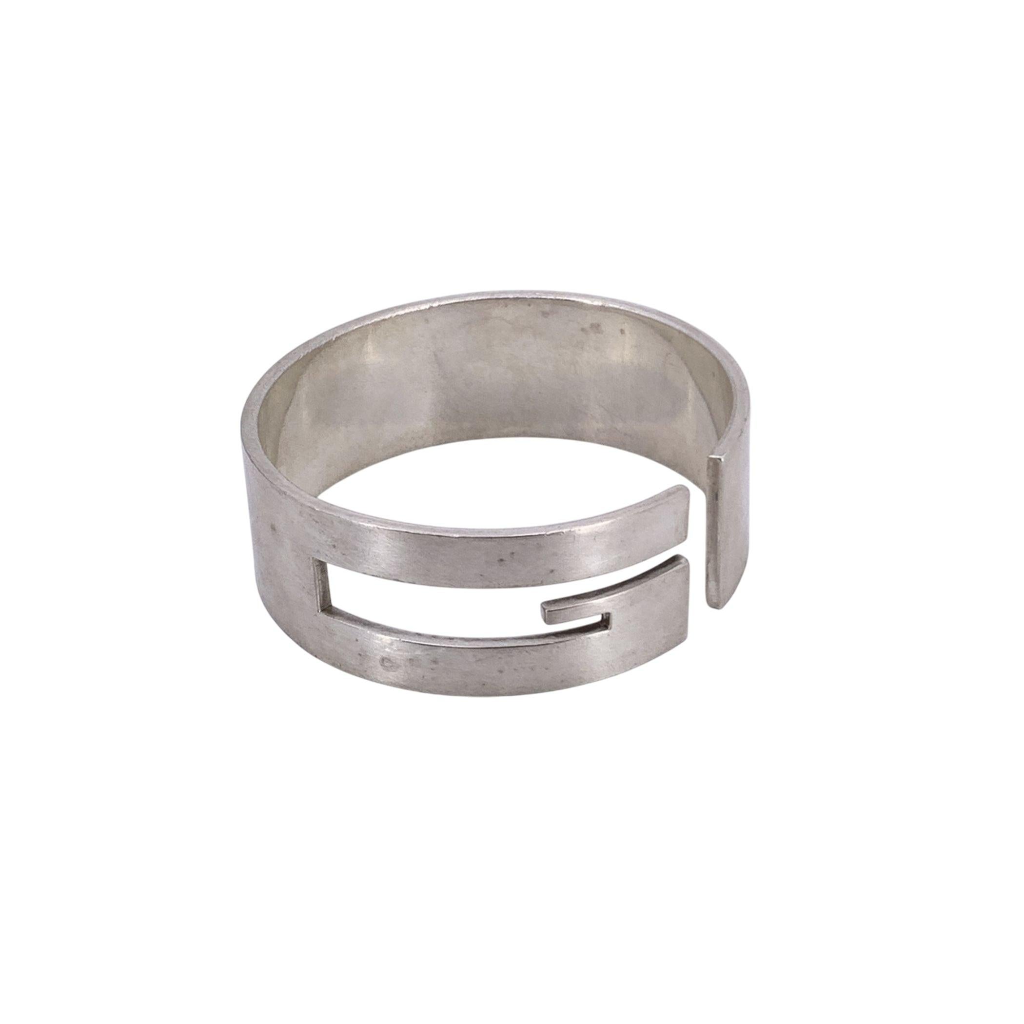 Understated elegance meets iconic branding in this vintage Gucci sterling silver bracelet, a refined piece that speaks softly but unmistakably of luxury. Crafted in 925 sterling silver and made in Italy, this sleek, minimal bangle is effortlessly