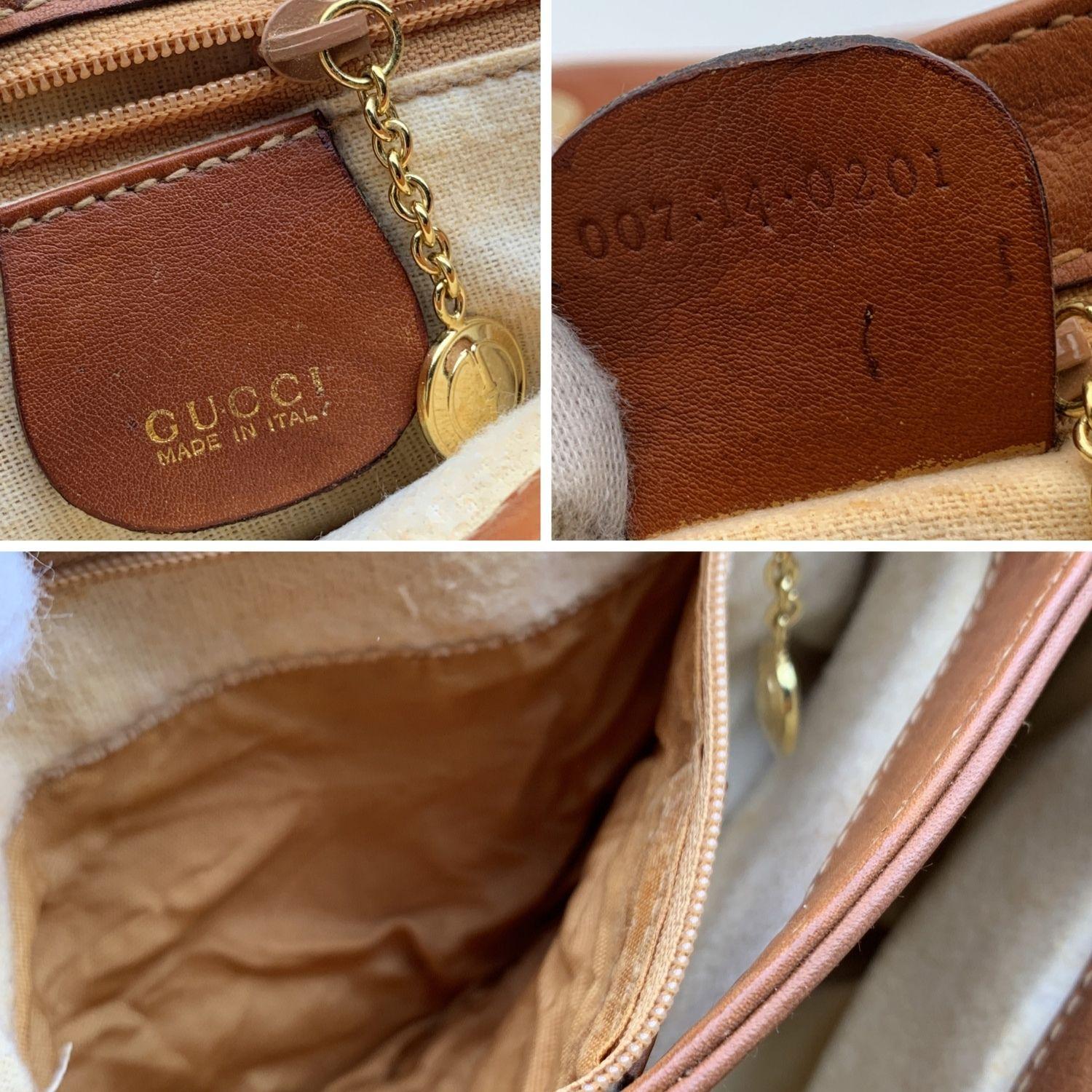 Gucci vintage shoulder bag. Tan leather. Flap with magnetic button closure. Gold metal show horse on the front with engraved Gucci lettering. 3 main compartments inside. Beige canvas lining. 1 side zip pocket inside. Adjustable shoulder strap.