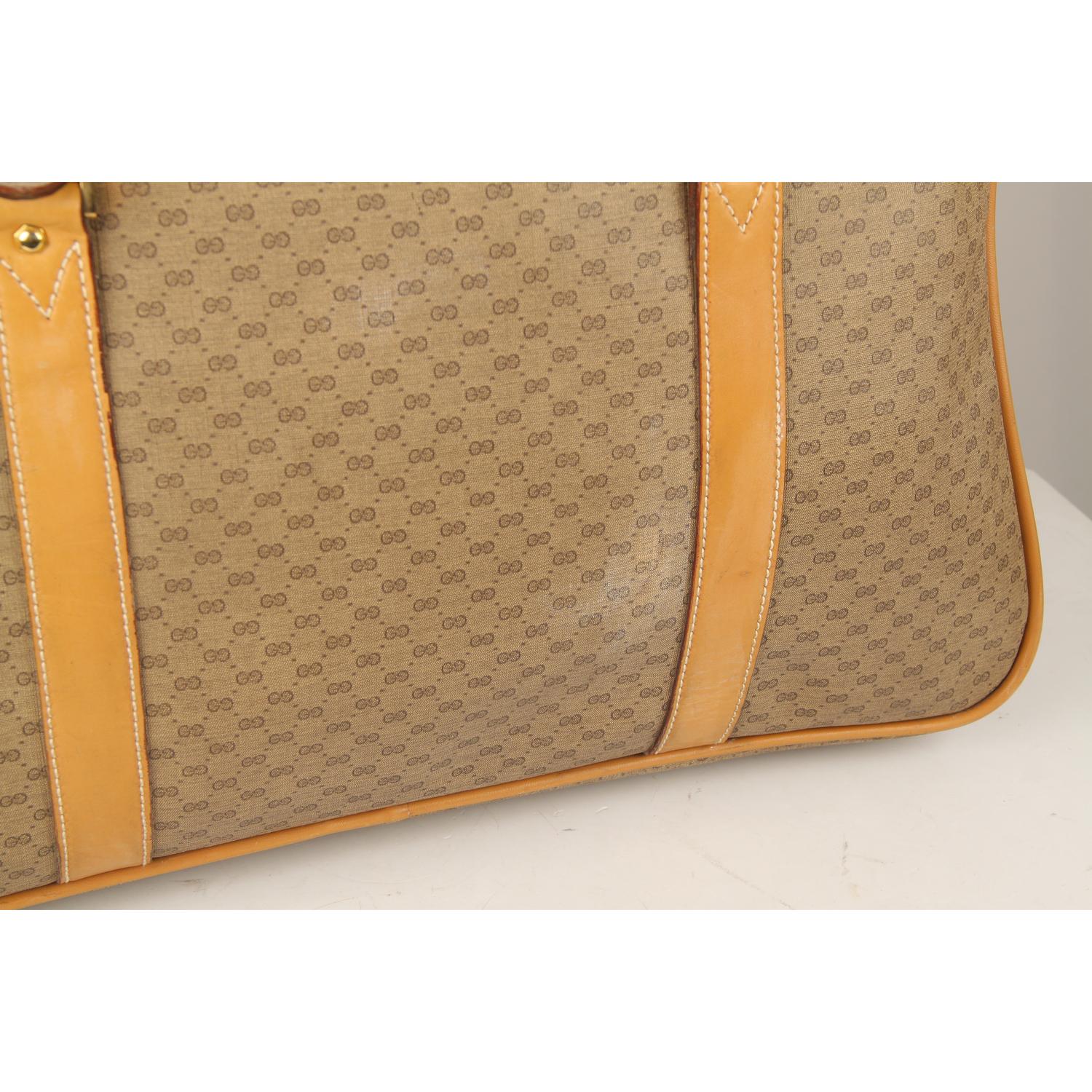 Women's or Men's Gucci Vintage Tan GG Monogram Canvas Suitcase Travel Bag