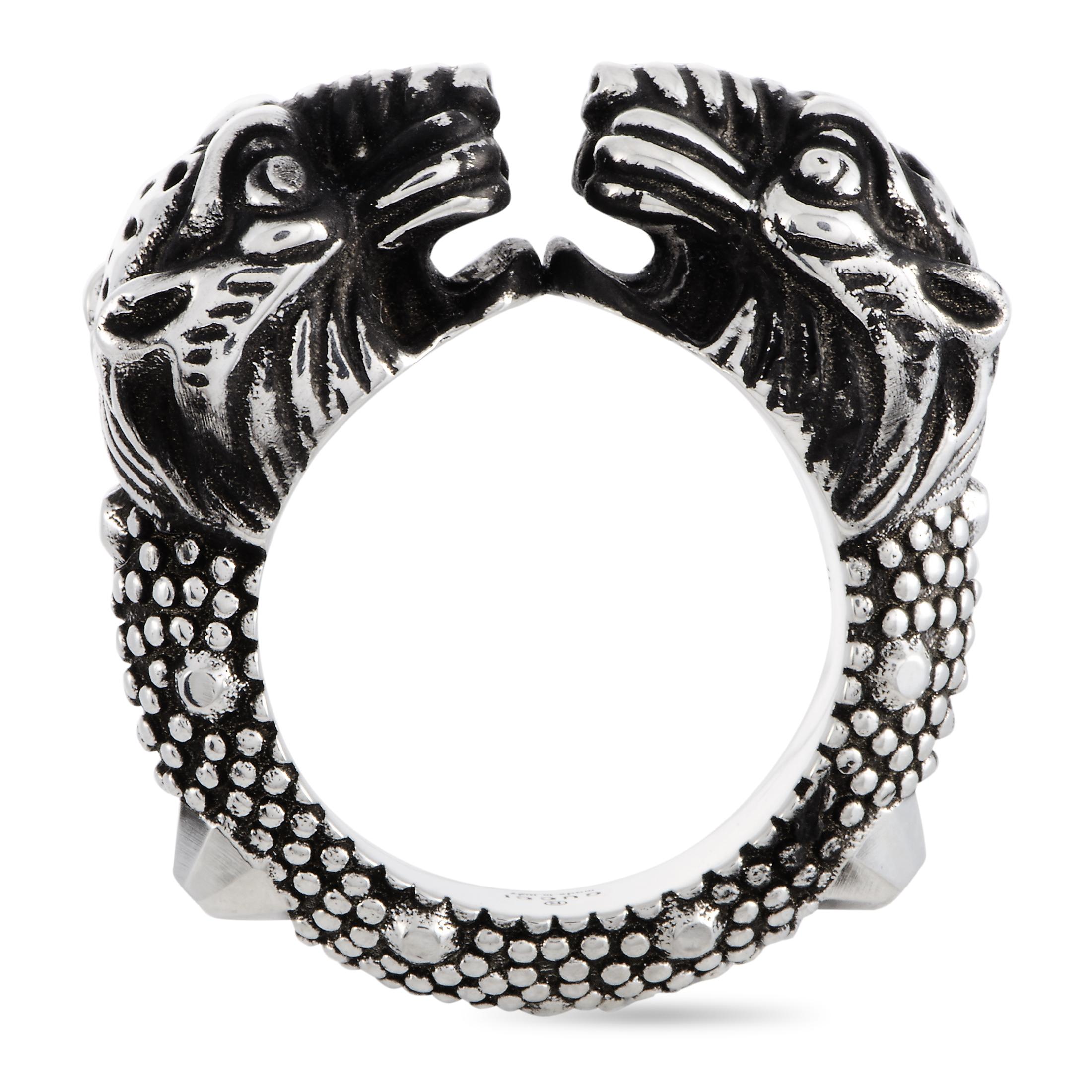 The Gucci “Vintage Tiger” ring is crafted from silver and weighs 16.7 grams. The ring boasts band thickness of 7 mm and top height of 10 mm, while top dimensions measure 12 by 30 mm.
 
 This item is offered in brand new condition and includes the