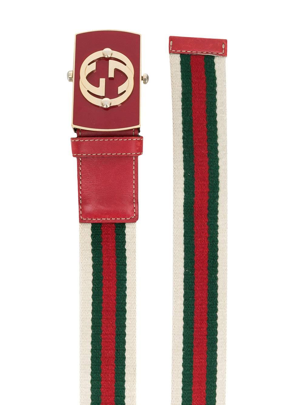 Ivory GG Web belt from Gucci Vintage featuring a clip fastening, a signature green and red Web detail and an enamelled logo buckle. 

Material: Polyester

One Size

Condition: Excellent, 9 out of 10