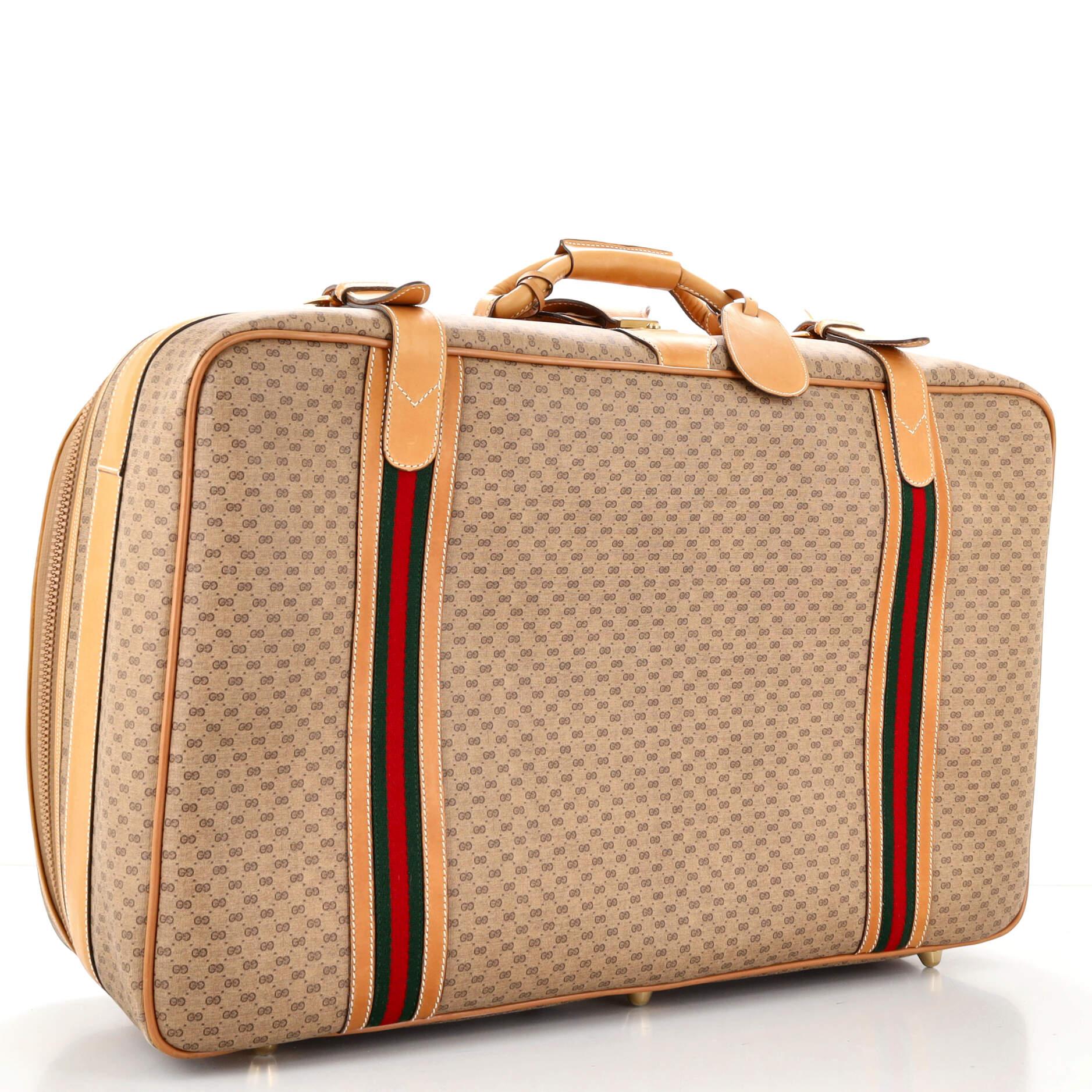 Gucci travel bag with wheels store