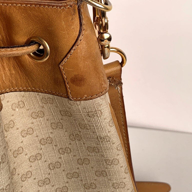 Gucci Vintage White Monogram Canvas Drawstring Bucket Bag at 1stDibs