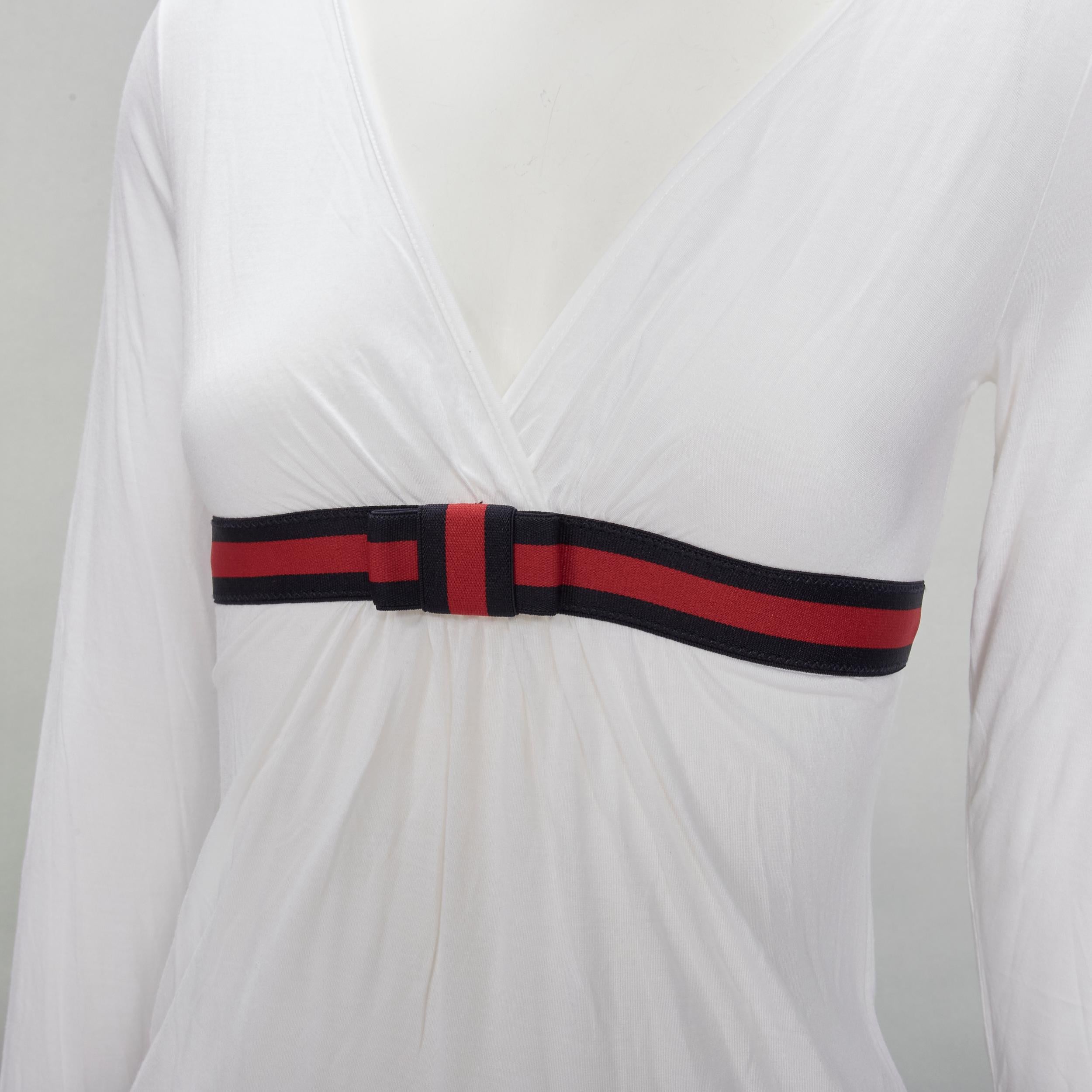 GUCCI VINtage white soft cotton navy red Web ribbon trim top XS
Brand: Gucci
Material: Feels like cotton
Color: White
Pattern: Solid
Extra Detail: V-neck. Grosgrain web bow ribbon trim.
Made in: Italy

CONDITION:
Condition: Excellent, this item was