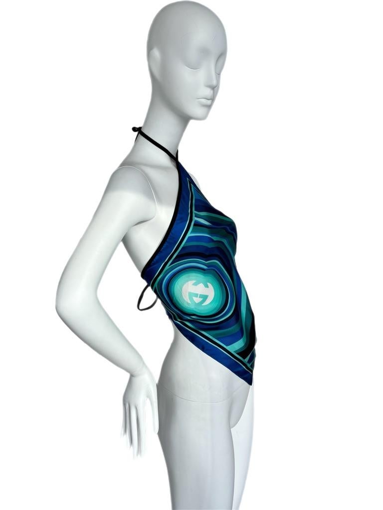 Gucci
Vintage
Super vibrant blue hues
100% silk
One size fits all
Excellent condition, just missing a metal part from tie as shown in last photo

FINAL SALE