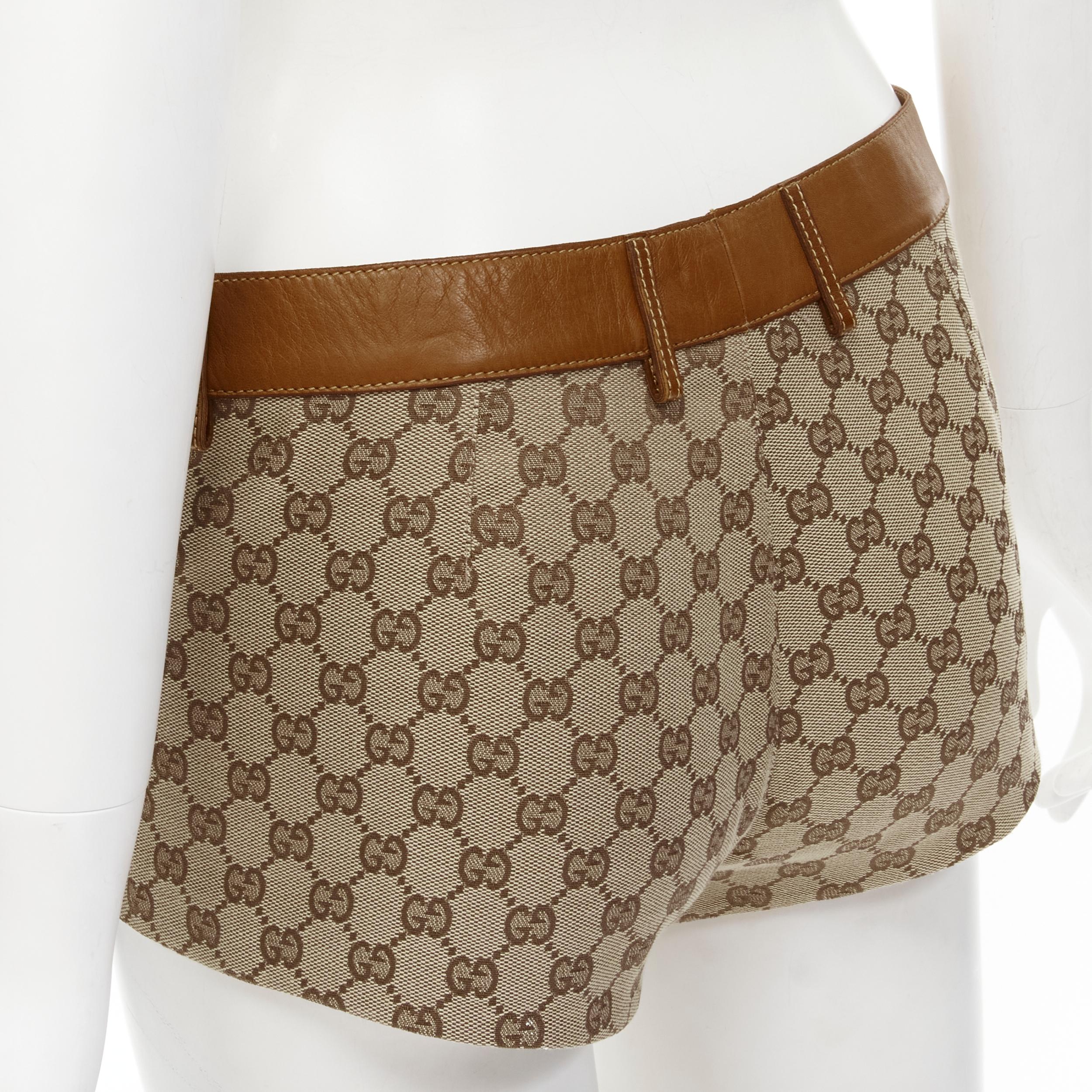 GUCCI Vintage Y2K brown leather trim brown GG monogram hot shorts IT38 XS 
Reference: ANWU/A00524 
Brand: Gucci 
Material: Cotton 
Color: Brown 
Pattern: Logo 
Closure: Zip 
Extra Detail: Leather trim at waist. Zip fly closure. 
Made in: Italy