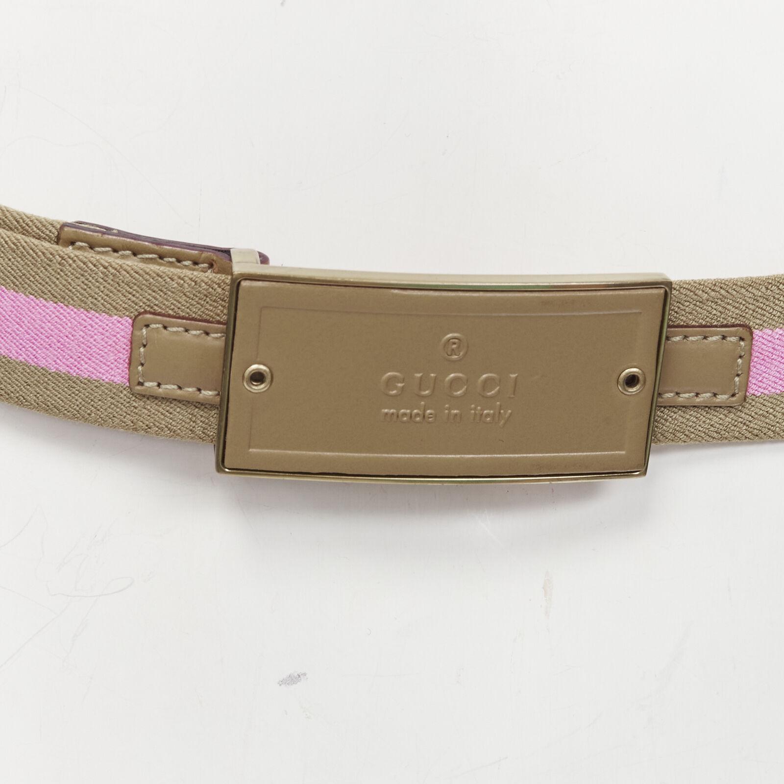 GUCCI Vintage Y2K pink khaki Web GG logo square buckle adjustable nylon belt
Reference: ANWU/A00864
Brand: Gucci
Material: Canvas
Color: Pink, Beige
Pattern: Striped
Closure: Belt
Made in: Italy

CONDITION:
Condition: Good, this item was pre-owned