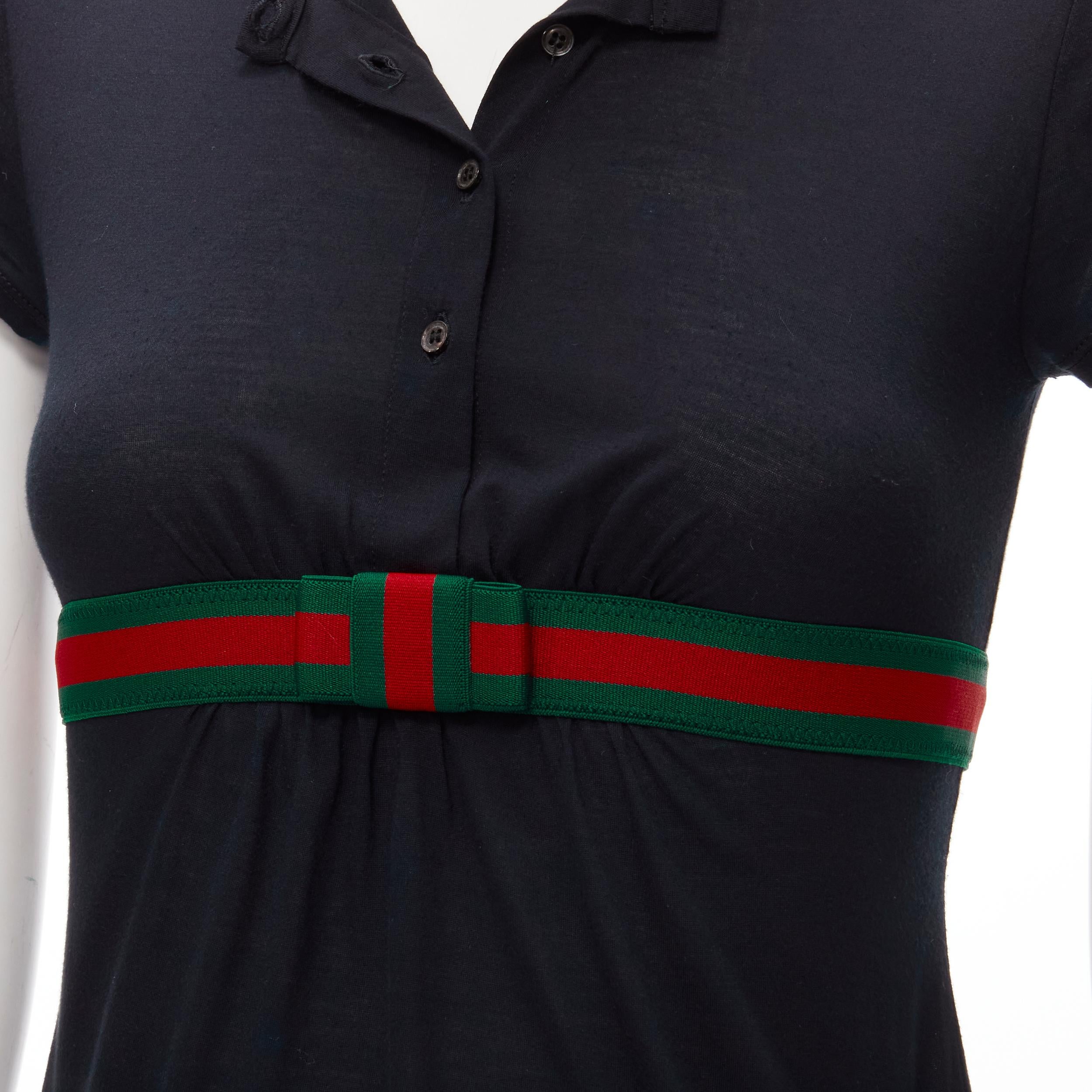 GUCCI Vintage Y2K Signature web bow black half button tshirt XS 
Reference: ANWU/A00646 
Brand: Gucci 
Material: Feels like cotton 
Color: Black 
Pattern: Solid 
Closure: Button 
Extra Detail: Grosgrain ribbon trim 
Made in: Italy 


CONDITION:
