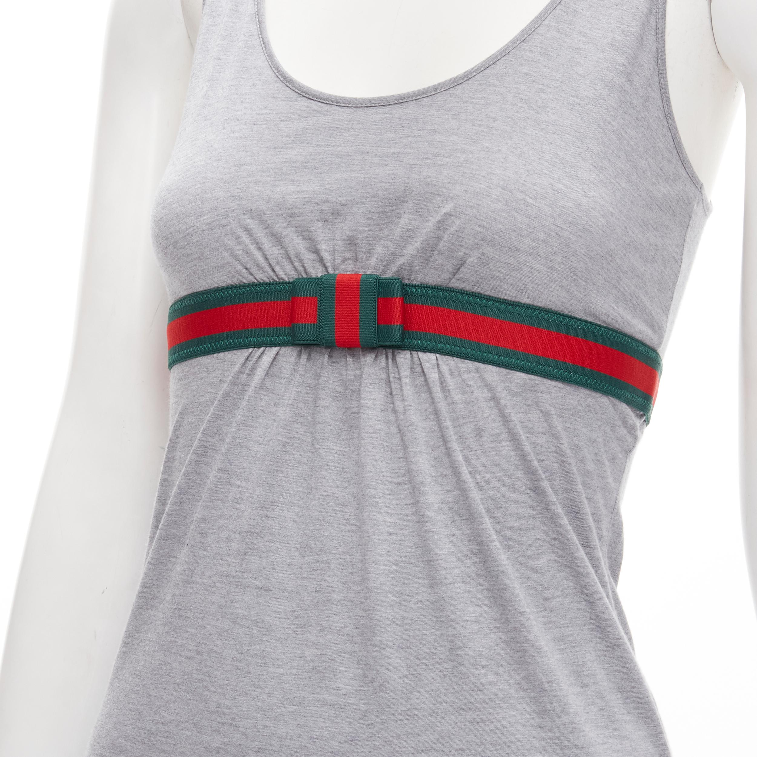 GUCCI Vintage Y2K Signature web ribbon bow trim grey tank top XS 
Reference: ANWU/A00599 
Brand: Gucci 
Material: Feels like cotton 
Color: Grey 
Pattern: Solid 
Extra Detail: Scoop neck. 
Made in: Italy


CONDITION:
Condition: Excellent, this item