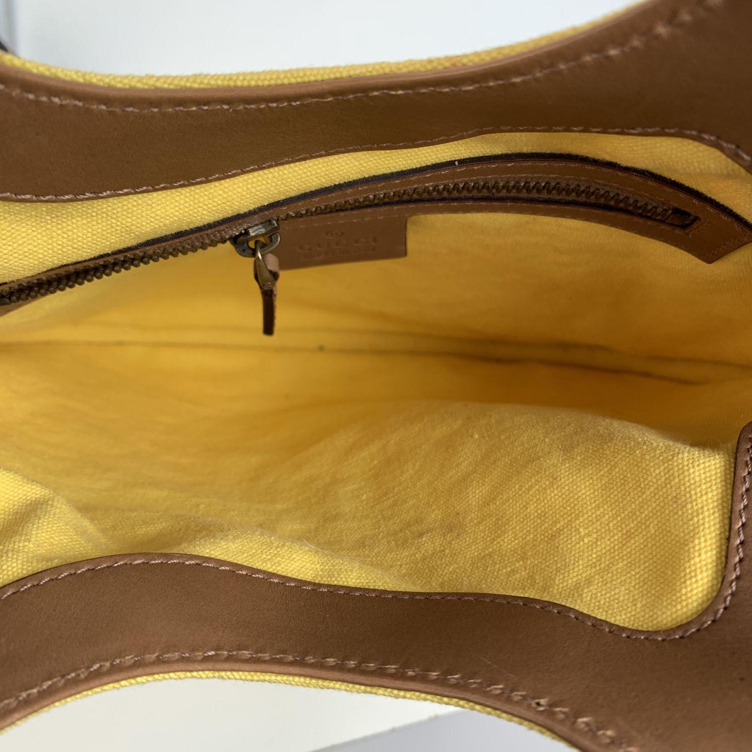 yellow studded handbag bag