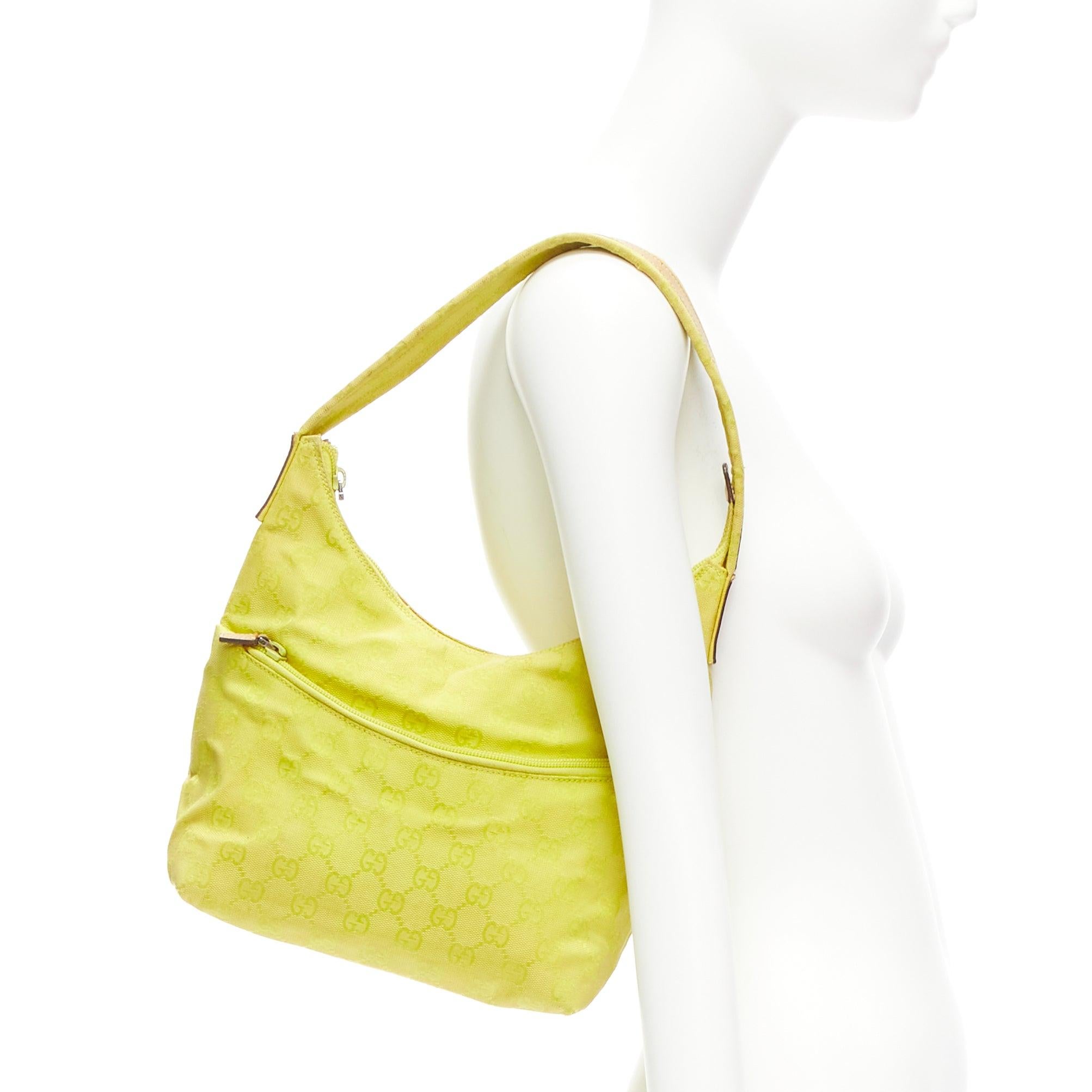 GUCCI Vintage yellow GG monogram canvas small hobo shoulder bag
Reference: KNCN/A00040
Brand: Gucci
Material: Fabric, Leather
Color: Neon Yellow, Brown
Pattern: Monogram
Closure: Zip
Lining: Beige Fabric
Extra Details: This hobo bag features a