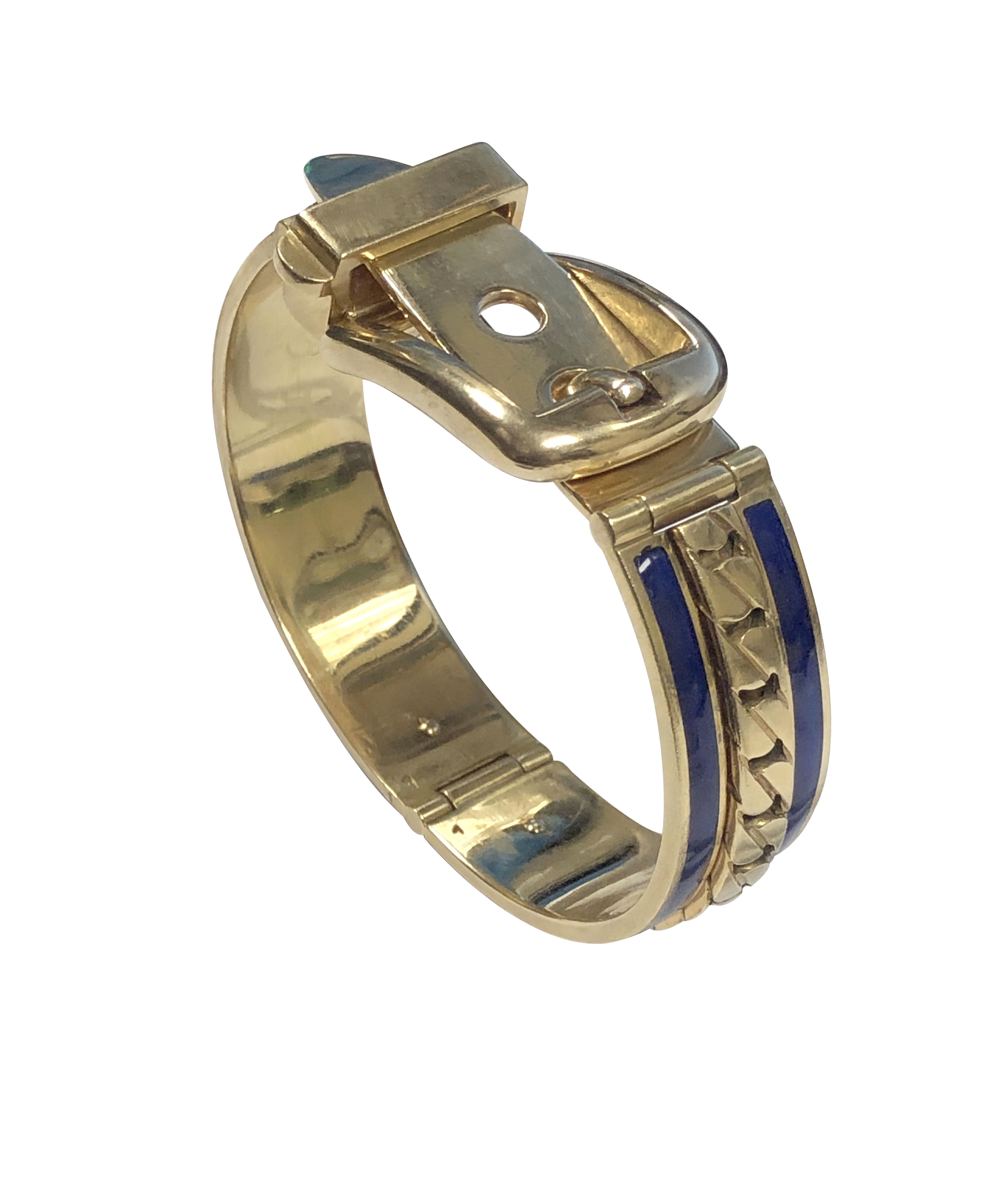 Circa 1970 Gucci Italy 18K Yellow Gold Buckle, Bangle Bracelet, measuring 9/16 inch wide and weighing 87.6 Grams. Having a center raise section of flat link chain with Cobalt Blue Enamel on either side. Wrist Size / Measurement 6 inches and is