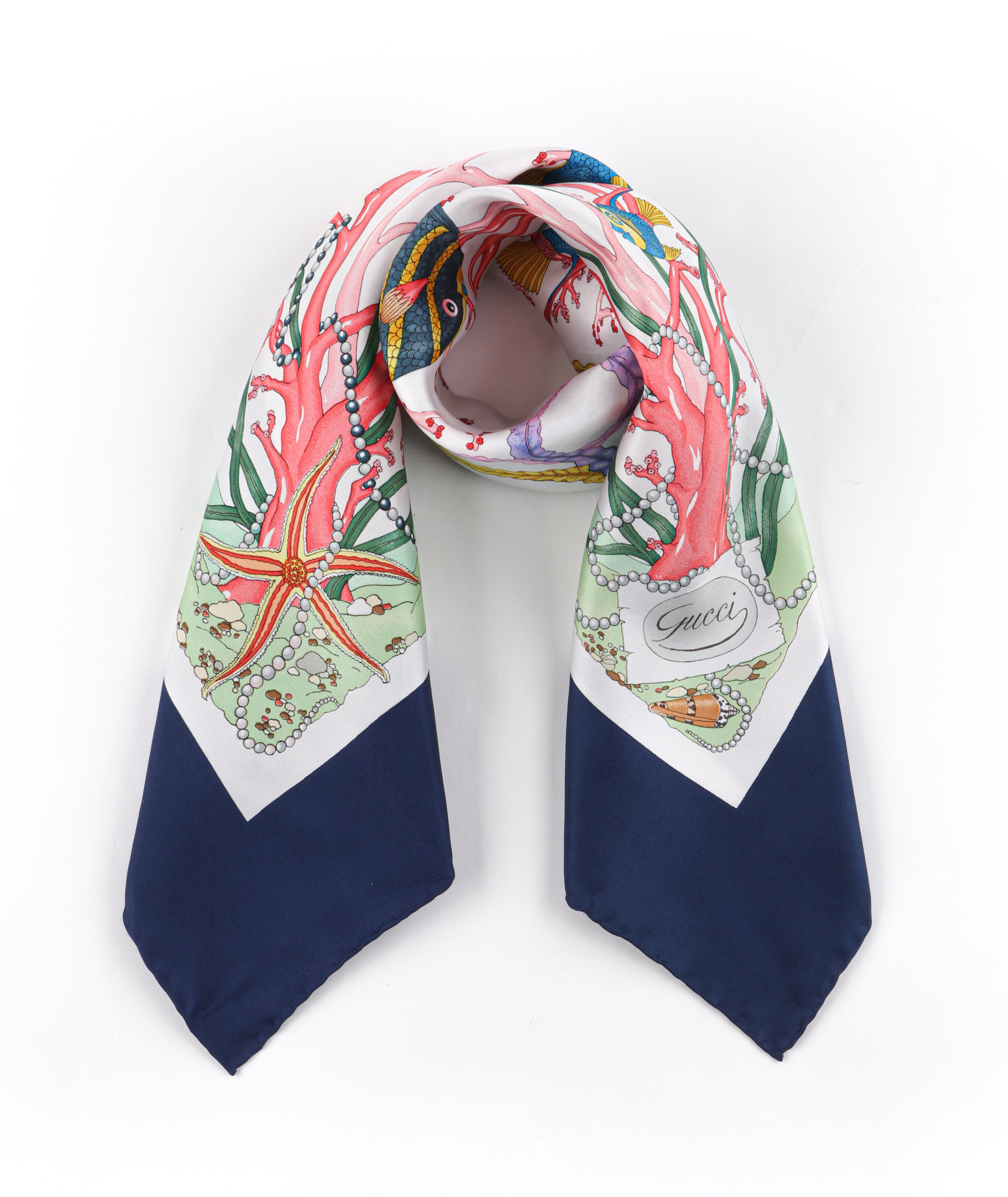 GUCCI Vittorio Accornero c.1960’s Blue Under the Sea Print Silk Square Scarf
 
Brand / Manufacturer: Gucci
Circa: 1960’s
Style: Square scarf
Color(s): Multicolor
Lined: No
Unmarked Fabric Content (feel of): 100% Silk
Additional Details / Inclusions:
