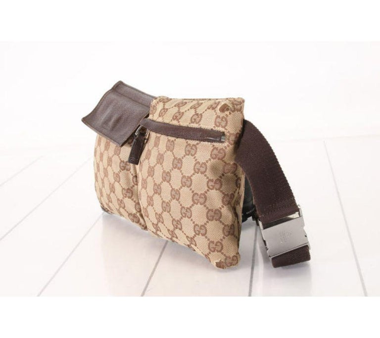 Gucci waist bag features beige GG Monogram canvas with silvertone