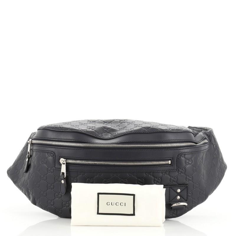 This Gucci Waist Bag Guccissima Leather Large, crafted from blue guccissima leather, this stylish and functional bag features black rubber trims, exterior front zip pocket, belt strap and silver-tone hardware accents. Its zip closure opens to a blue