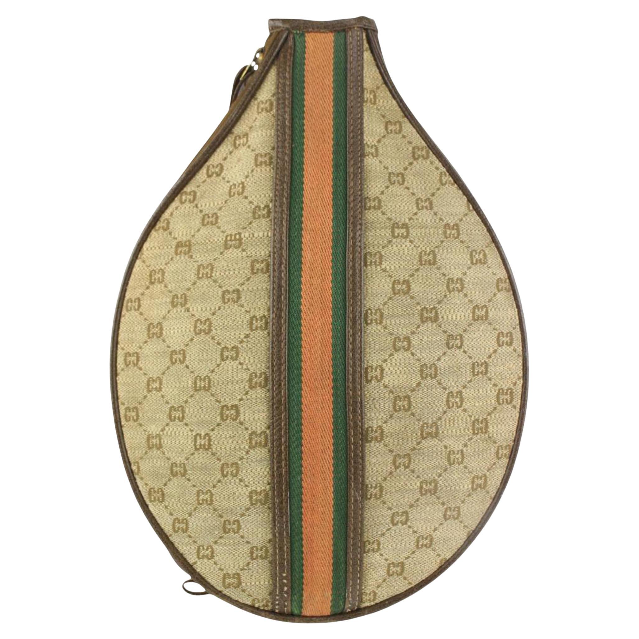 Sold at Auction: GUCCI AND LOUIS VUITTON. 1) BLUE LEATHER GUCCI TENNIS  RACQUET BAG. FIRST TIME I SAW ONE OF THESE WAS