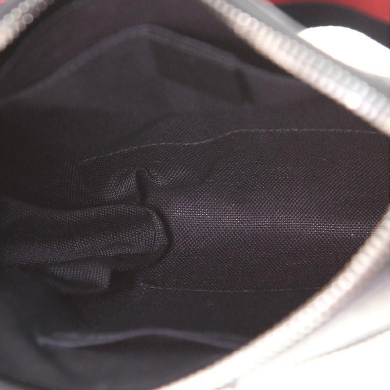 Gucci Borsa messenger con tracolla e zip frontale GG in tela Coates Small 1