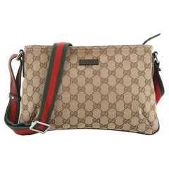 Gucci Web Zip Crossbody GG Canvas klein Gucci Web Zip Crossbody GG Canvas klein