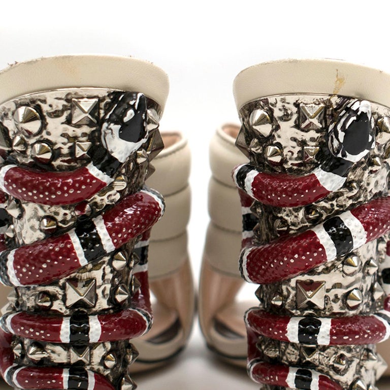 gucci mules with snake
