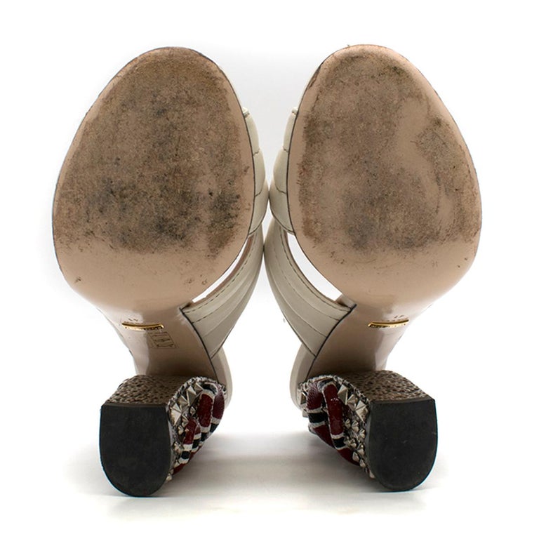 gucci mules with snake