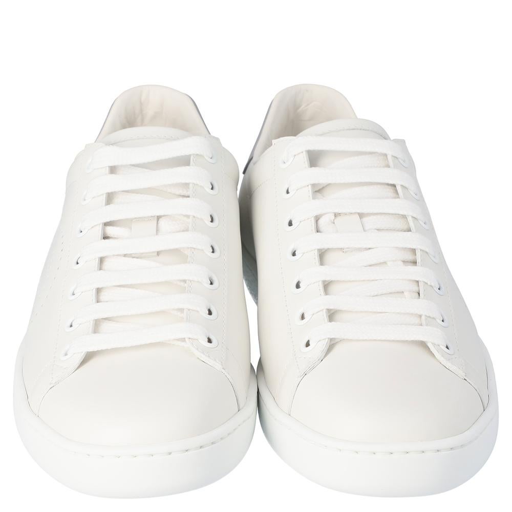 Stacked with signature details, this Gucci pair is rendered in white leather and designed in a low-cut style with lace-up vamps. Set on durable soles, these Ace shoes can be easily coordinated with your casuals.

Includes: Original packaging