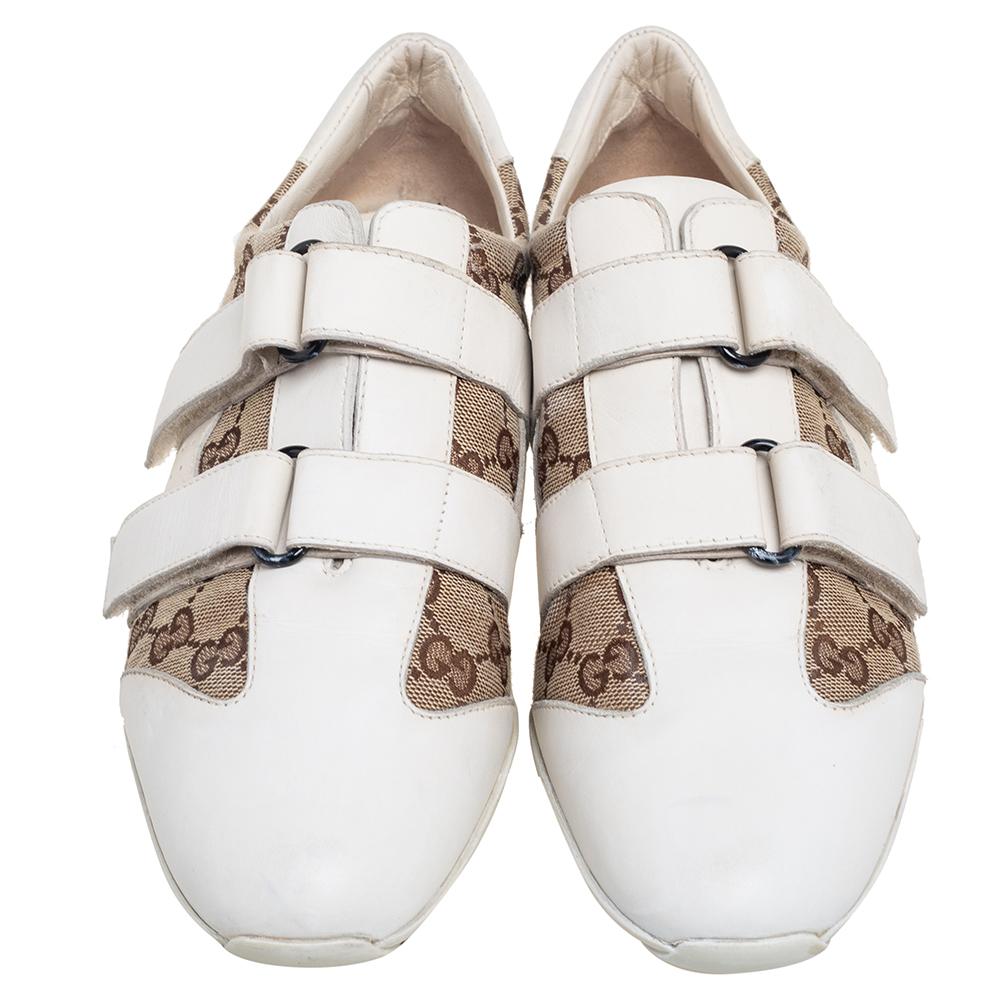Coming from the House of Gucci, these sneakers undoubtedly provide your feet with the best experience. They are created using white-beige GG canvas and leather on the exterior with velcro straps adorning the vamps. The leather lining and