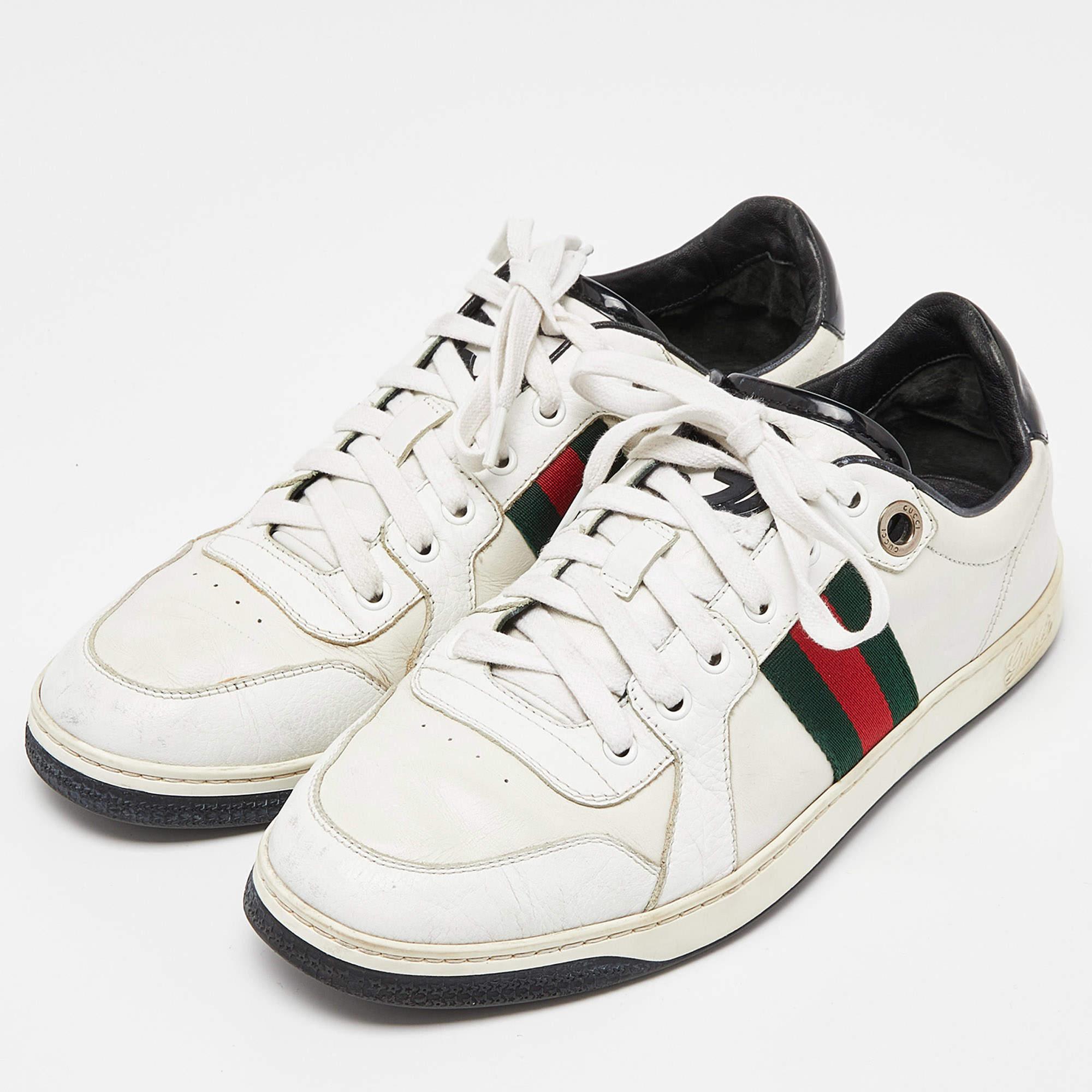 Stacked with signature details, this Gucci pair is rendered in leather and is designed in a low-top style with lace-up vamps. They have been fashioned with the iconic Web stripes. Complete with logo-accented counters, these shoes can be easily