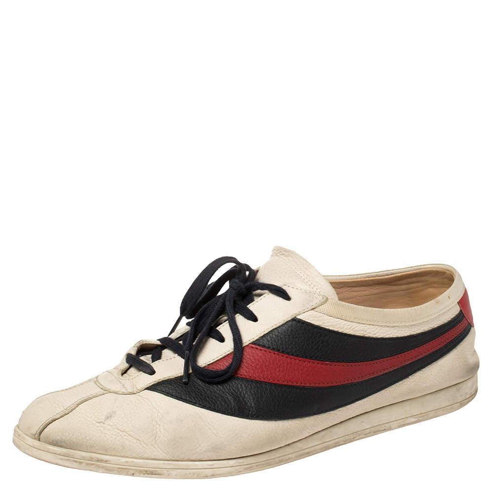 These low-top sneakers are designed with retro influence in leather with Web stripes along the sides. They are equipped with laces on the vamps and mismatched heel counters accented with the signature bee motif.

