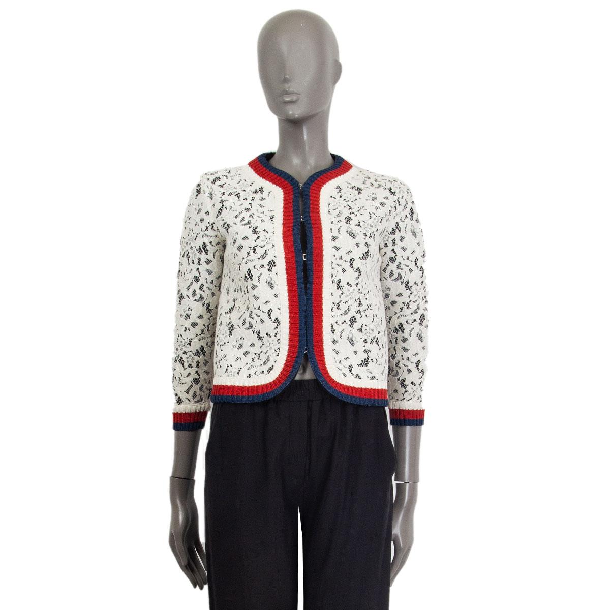 100% authentic Gucci cropped lace jacket in white cotton (40%), viscose (34%), polyamide (26%), and white, red and blue trimming detail in viscose (67%), polyester (29%), polyamide (4%).Trimmed with the label's signature web stripes, has a slightly