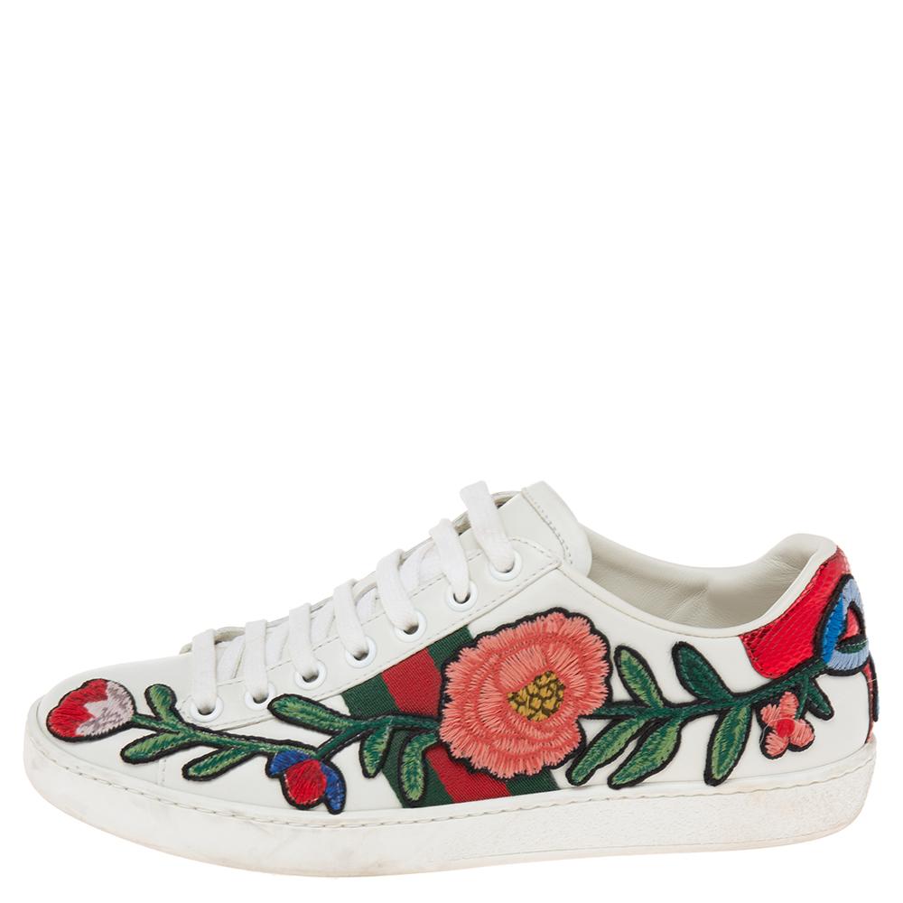 Stacked with signature details, this Gucci pair is rendered in leather and is designed in a low-cut style with lace-up vamps. They have been fashioned with iconic Web stripe and floral embroidery. Complete with a bow accent on the counters, these