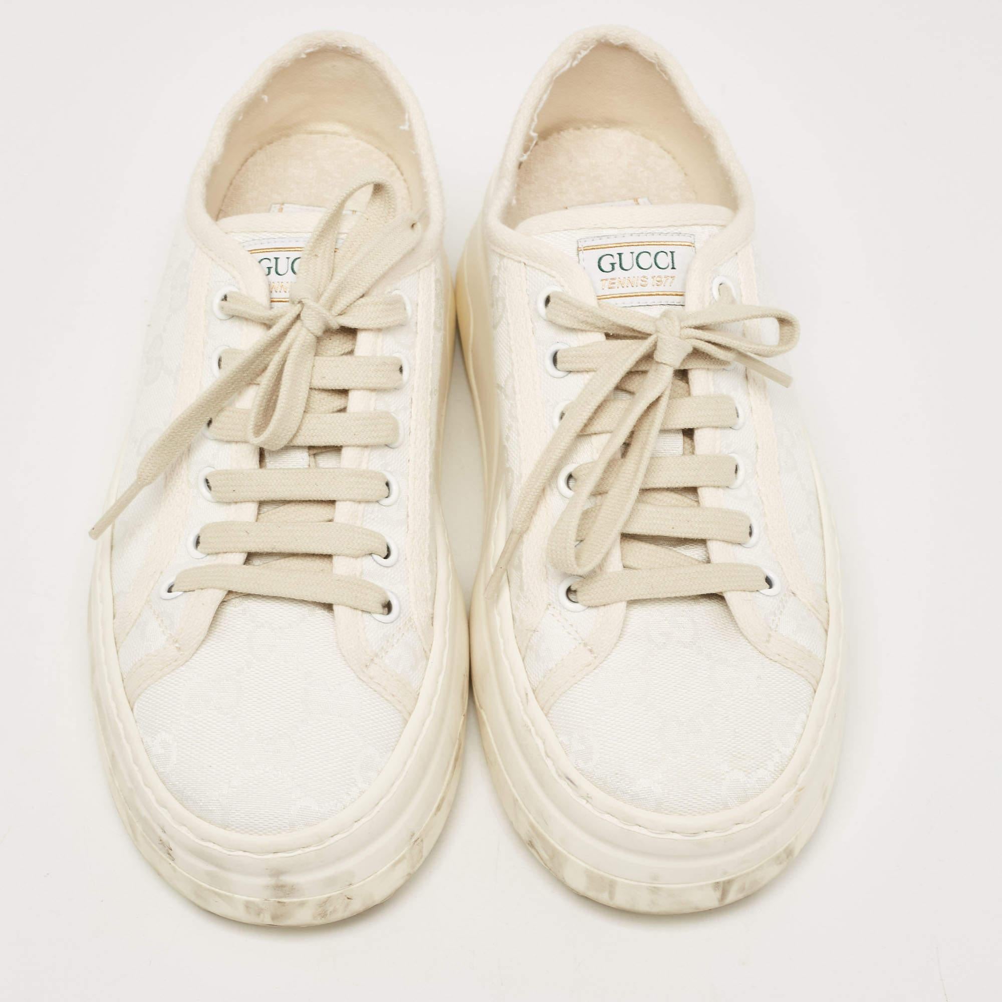 Packed with style and comfort, these Gucci sneakers are gentle on the feet so that you can glide through the day. They have a sleek upper with lace closure, and they're set on durable rubber soles.

