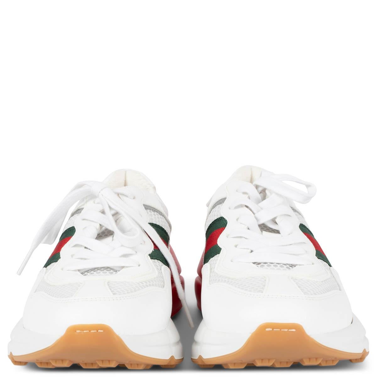 100% authentic Gucci Rython sneakers in white leather and mesh with classic web-stripe in green & red on the side. The design features a chunky white, red and green rubber sole and is lined in white terry cloth. Brand new. Come with dust bags.