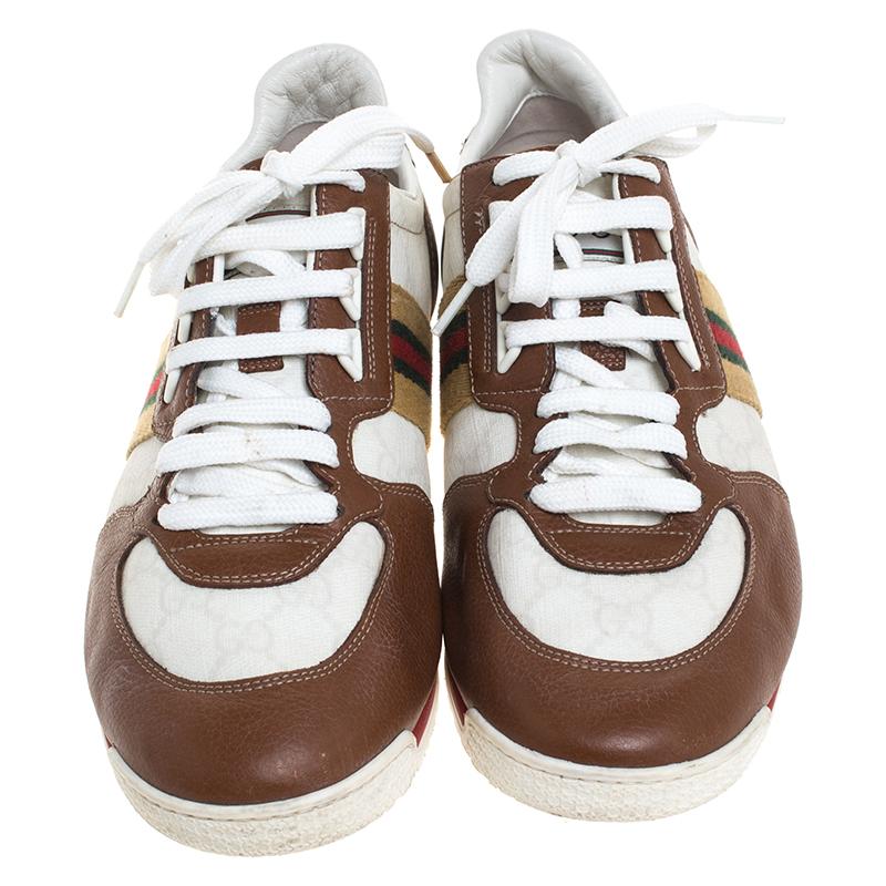 This pair of sleek sneakers from Gucci is a beauty sewn with expertise. They are covered in Guccissima canvas and designed with leather trims, web details and lace-ups. The sneakers have a lovely shape and are so stylish, they'll complement your