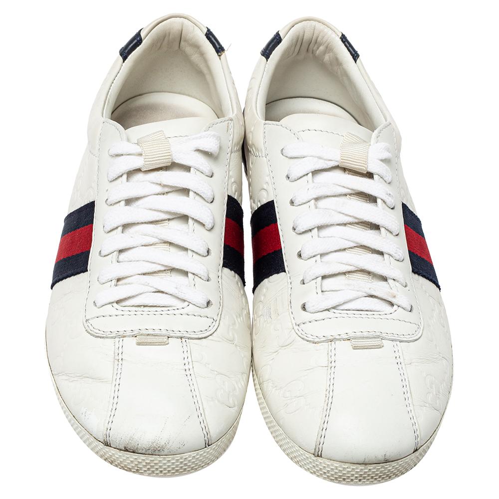 Stacked with signature details, this Gucci pair is rendered in Guccissima leather and is designed in a low-cut style with lace-up vamps. They have been fashioned with iconic web stripes. Complete with contrasting trims on the counters, these shoes