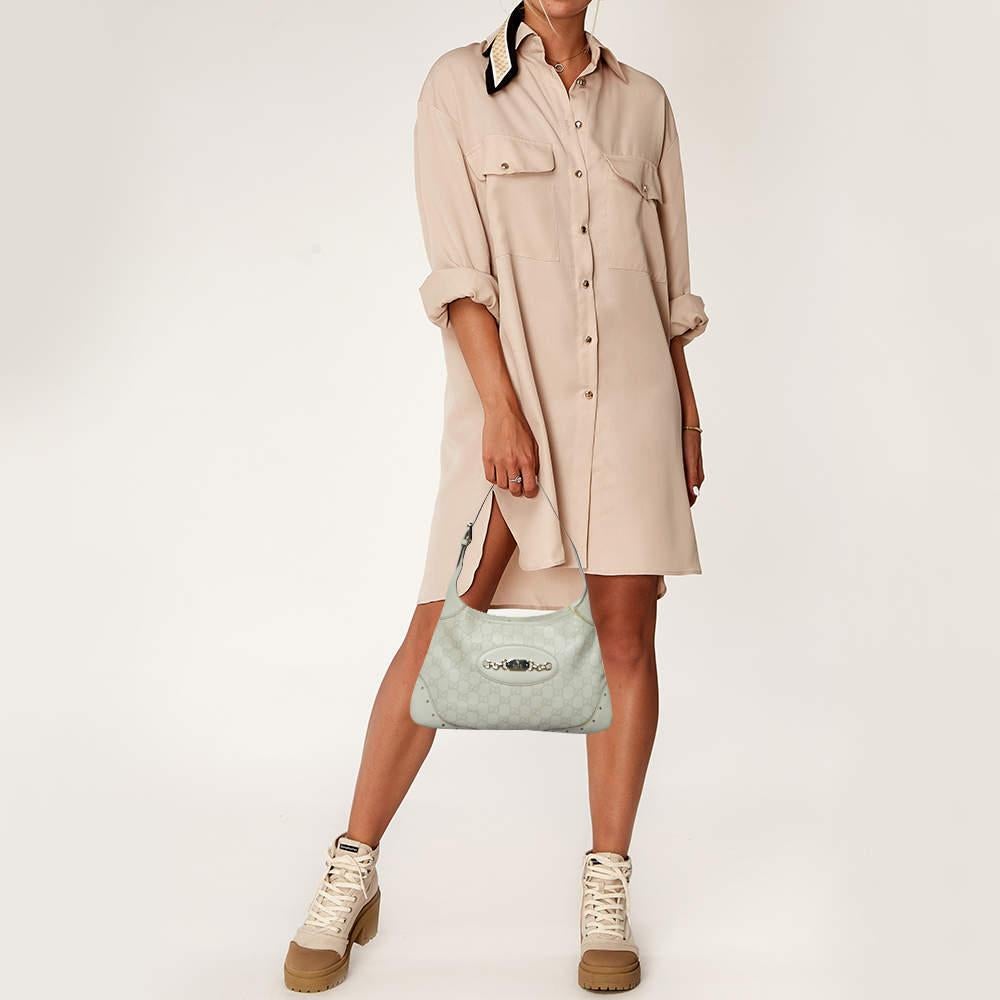 Stylish handbags never fail to make a fashionable impression. Make this designer hobo yours by pairing it with your sophisticated workwear as well as chic casual looks.