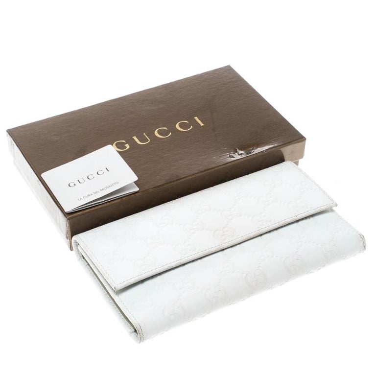 Gucci White Guccissima Leather Trifold Wallet For Sale at 1stdibs