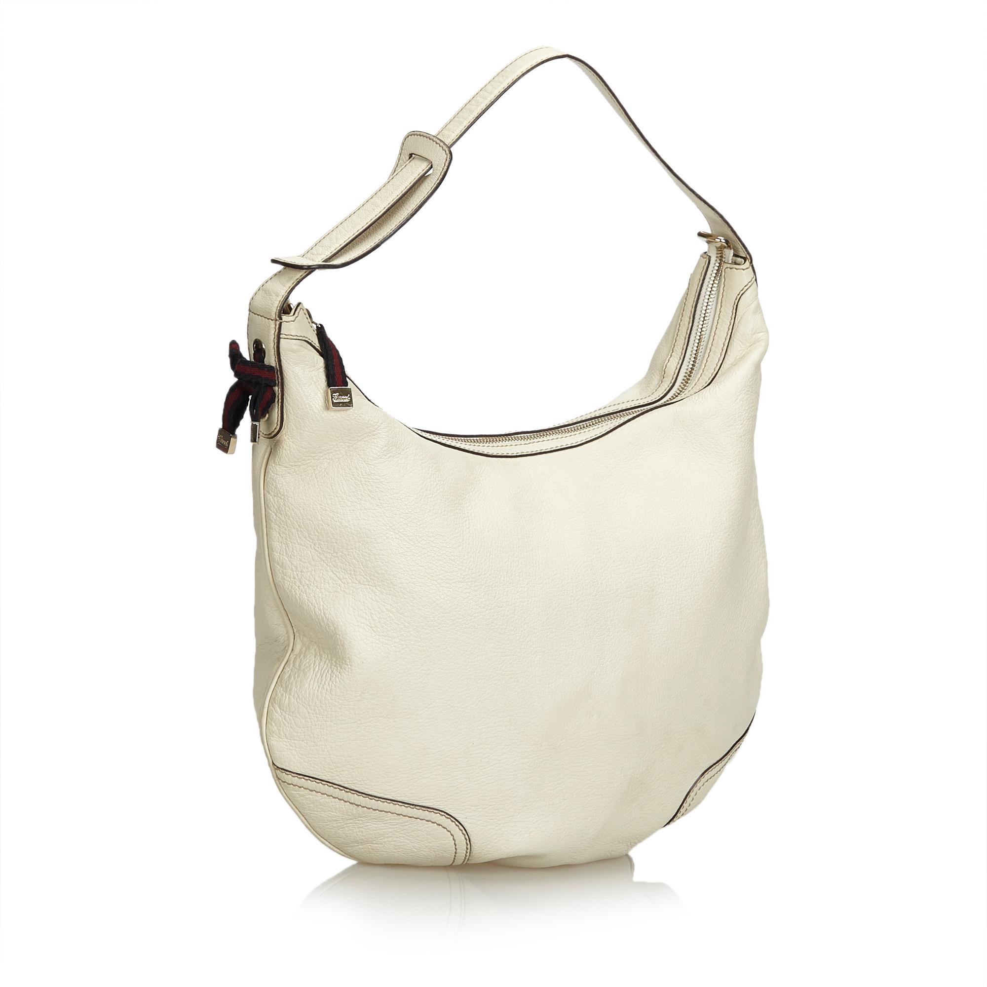 The Princy Hobo Bag features a leather body, flat leather strap, a top zip closure, and interior zip and slip pockets. It carries as B+ condition rating.

Inclusions: 
This item does not come with inclusions.

Dimensions:
Length: 31.00 cm
Width: