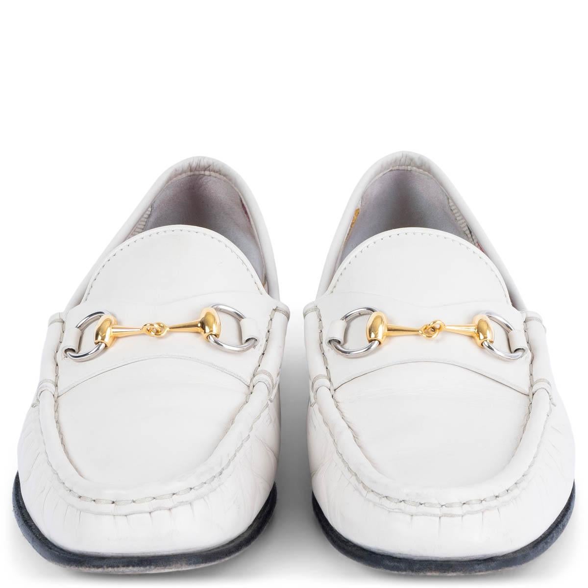 100% authentic Gucci 1953 Horsebit loafers in off-white smooth leather with gold- and silver-tone hardware. Have been worn and are in excellent condition. Come with dust bag. 

Measurements
Imprinted Size	37
Shoe Size	37
Inside Sole	24cm