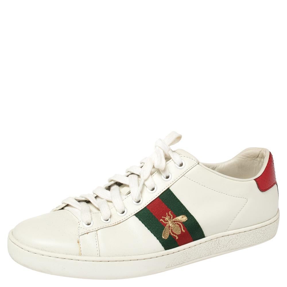 Stacked with signature details, this Gucci pair is rendered in leather and is designed in a low-cut style with lace-up vamps. They have been fashioned with iconic Web stripes and bee motifs. Complete with mismatched counters, these shoes can be